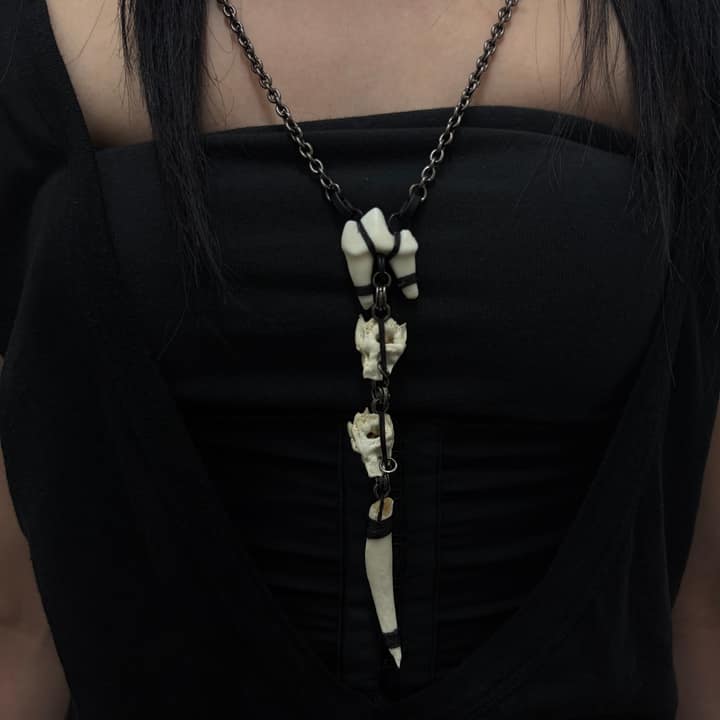 Large nail mixed bone necklace
